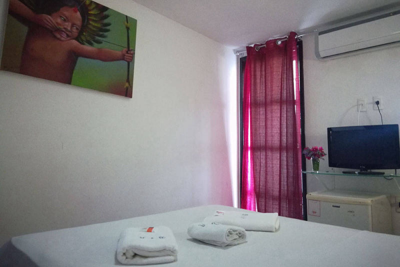 Quarto solteiro com vista mar