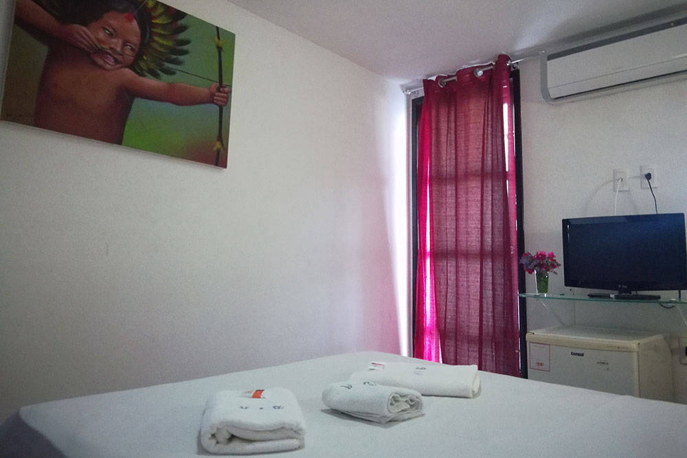 Quarto solteiro com vista mar