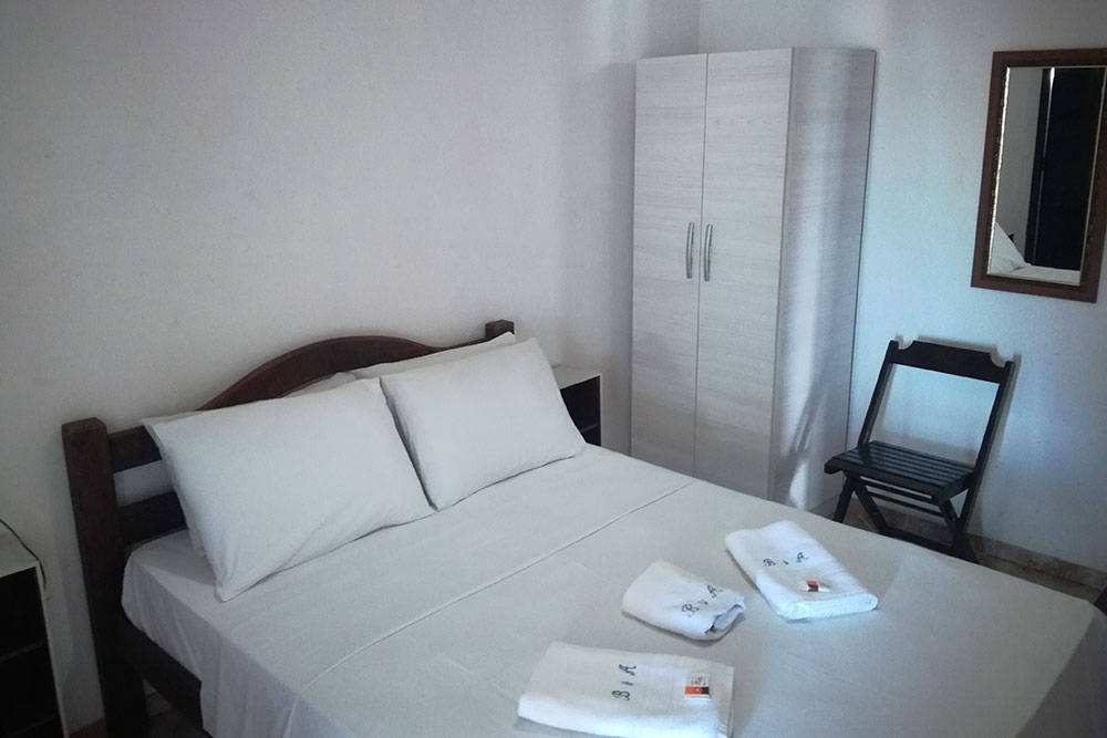 Quarto solteiro com vista mar