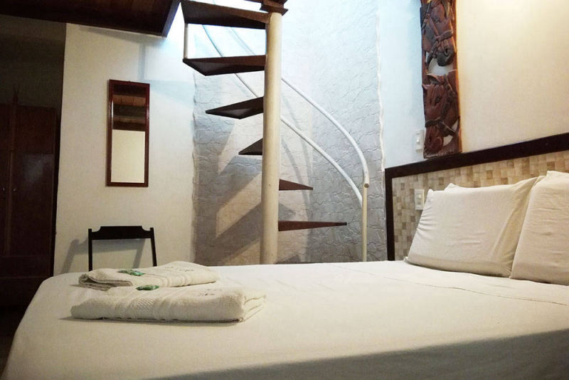 Quarto triplo com vista mar
